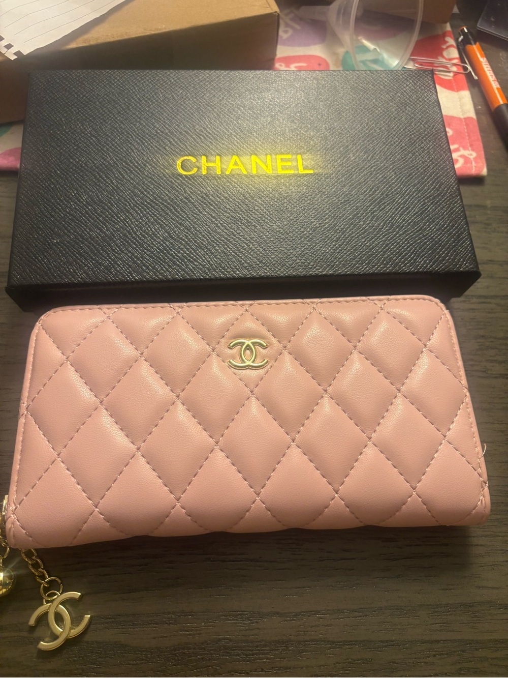 CHANEL Pink Quilted Zip-Around Wallet with CC Charm